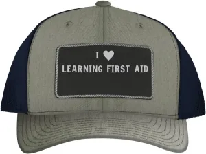 I Heart Love Learning First Aid - Leather Black Patch Engraved Trucker Hat